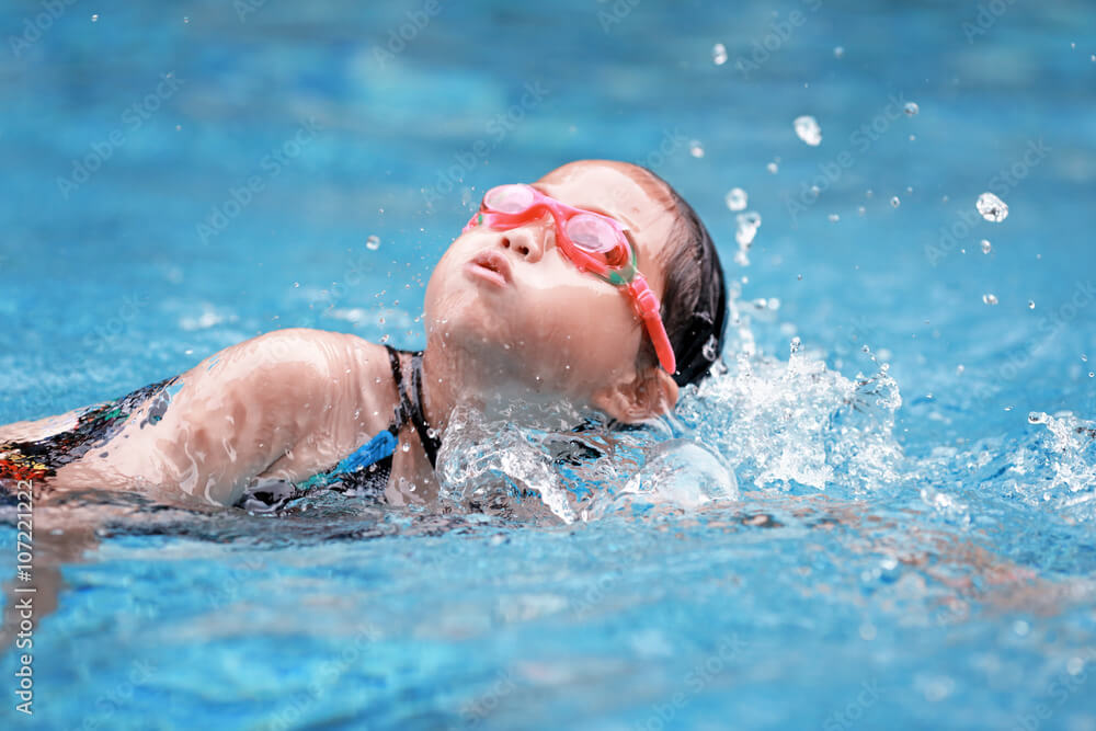 Protecting Your Child's Skin: Swimming with Eczema 2 children swimming pool